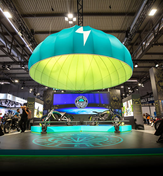 EICMA trade show exhibit with motorcycles